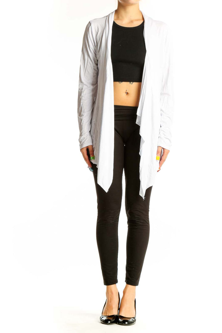 Front view of white draped open front cardigan by URBAN COCO