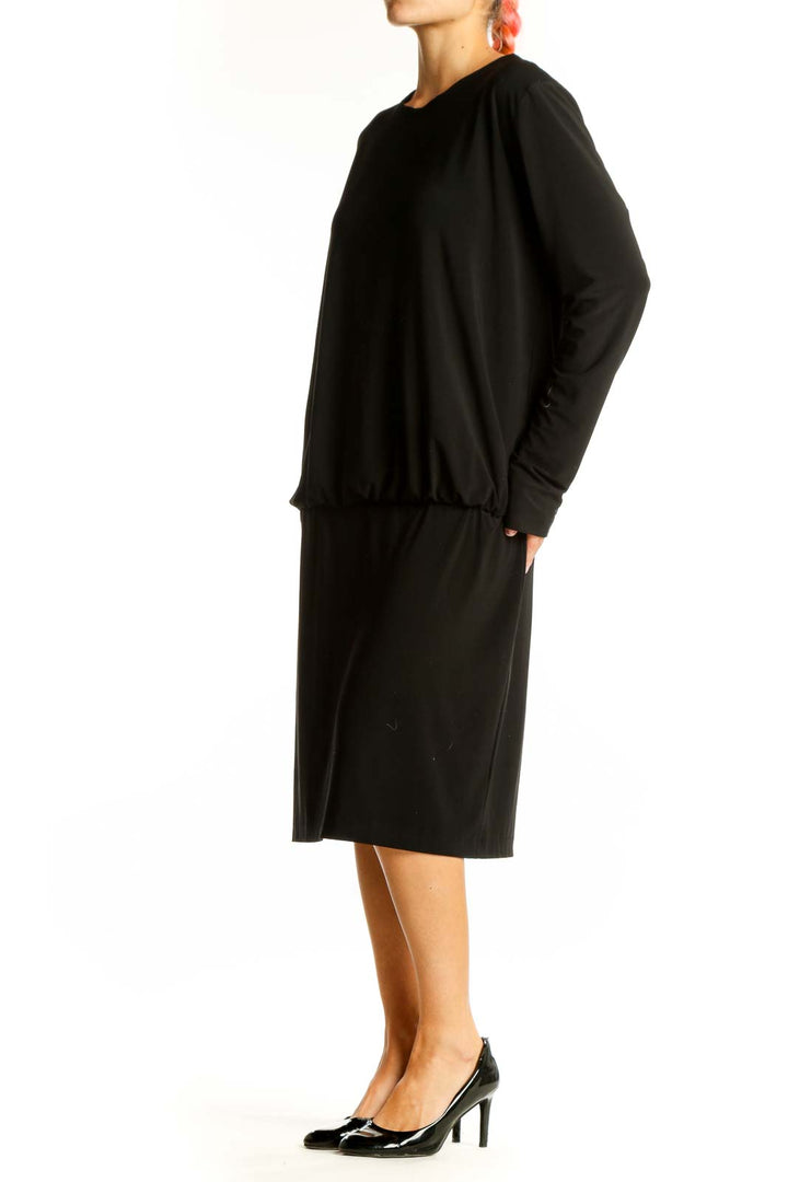 Front view of NORMA KAMALI black long-sleeve midi dress