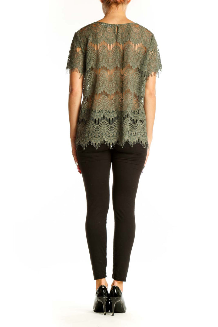 Side view of olive lace overlay short sleeve top by GENERATION LOVE New York