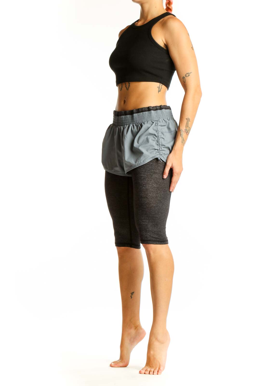 Front view of gray Athleta layered athletic shorts with fitted undershorts