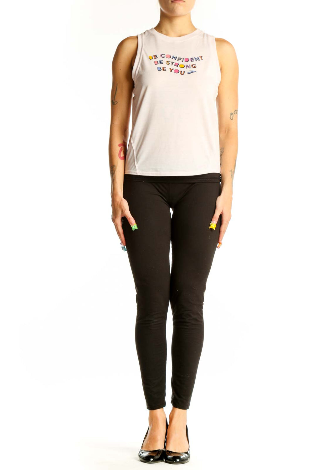Front view of white Brooks sleeveless tank top with colorful motivational message