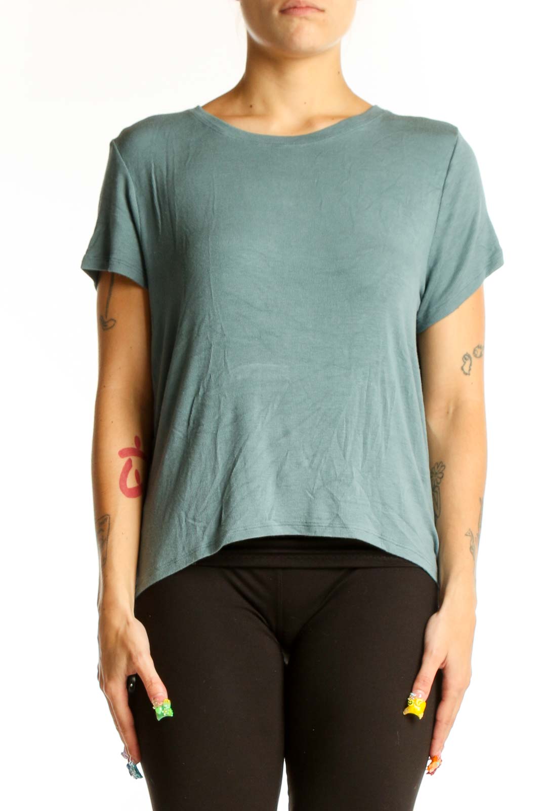 Front view of sage green Athleta athletic top with short sleeves