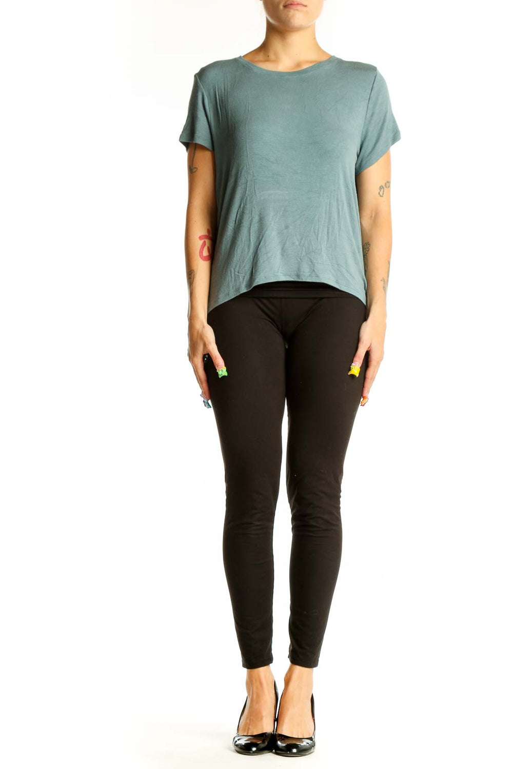 Front view of sage green Athleta athletic top with short sleeves