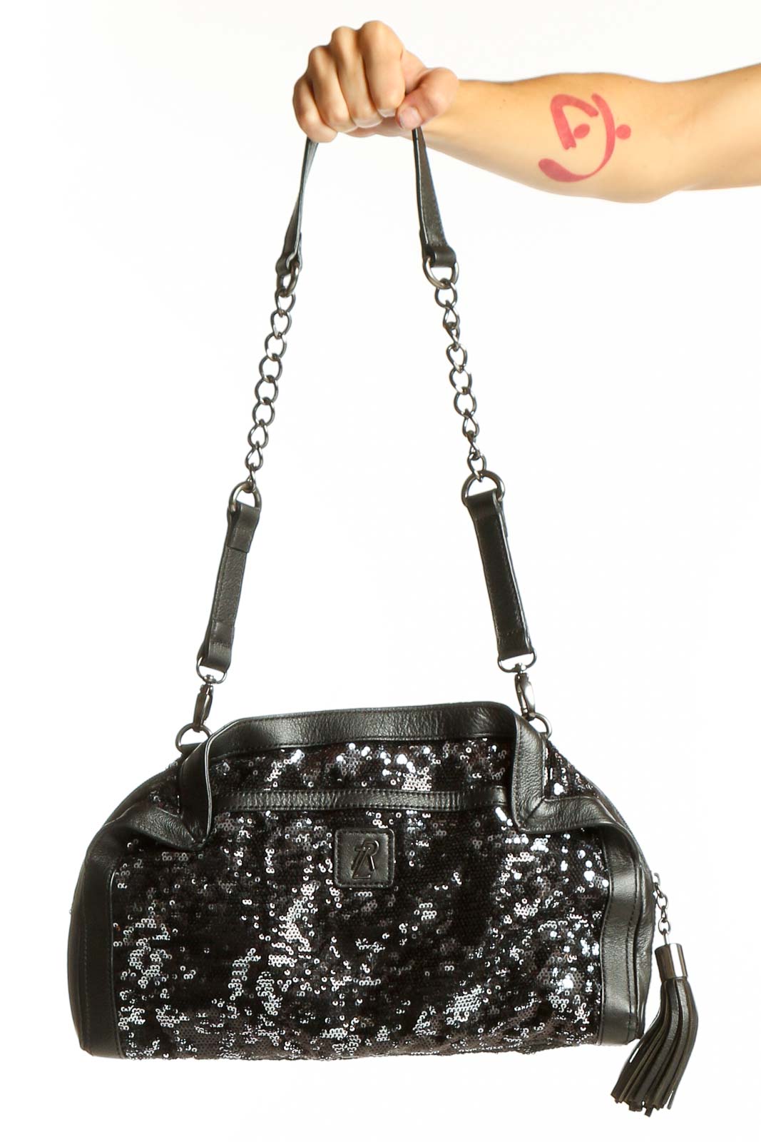 Front view of Rachel Zoe black sequined evening clutch with chain strap