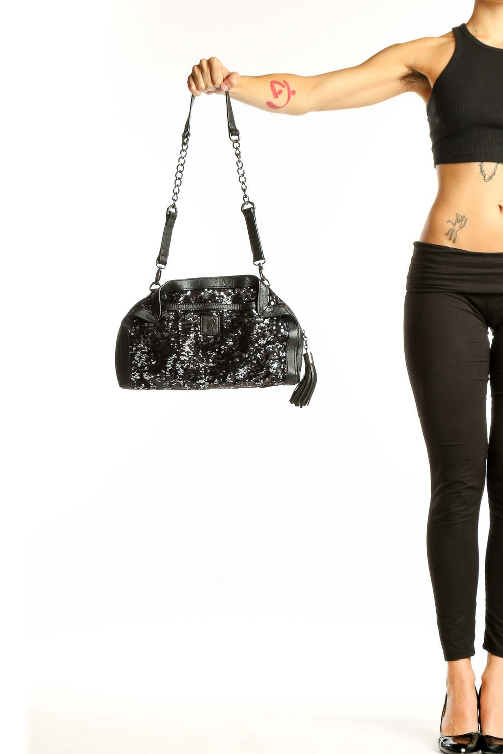 Front view of Rachel Zoe black sequined evening clutch with chain strap