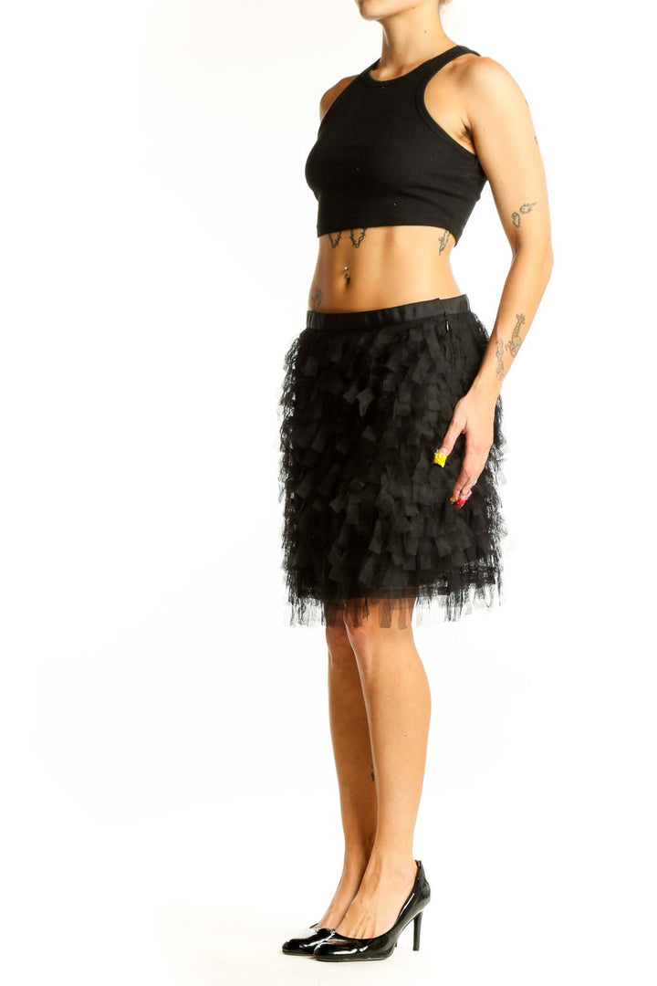 Front view of black ruffled tulle mini skirt from LOFT