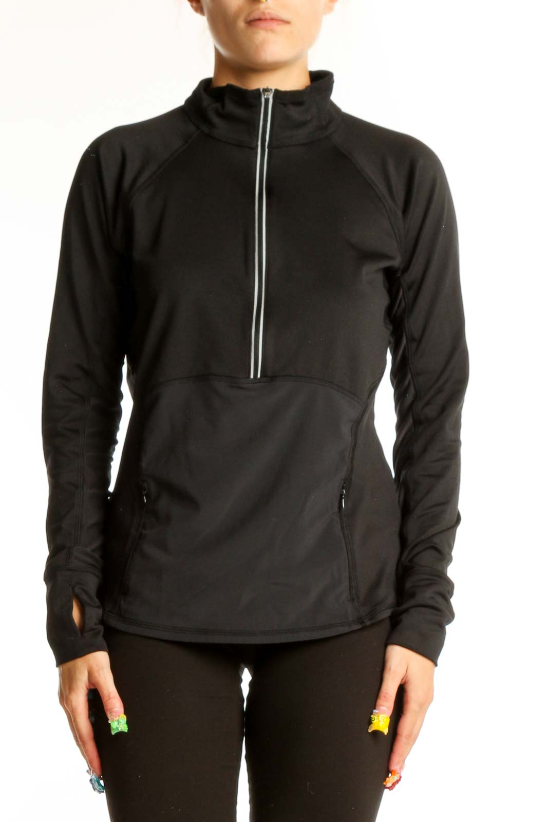 Front view of black Athleta half-zip performance top with stand-up collar