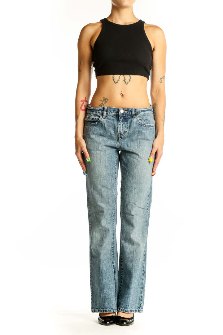Front view of Calvin Klein light blue straight leg jeans on model