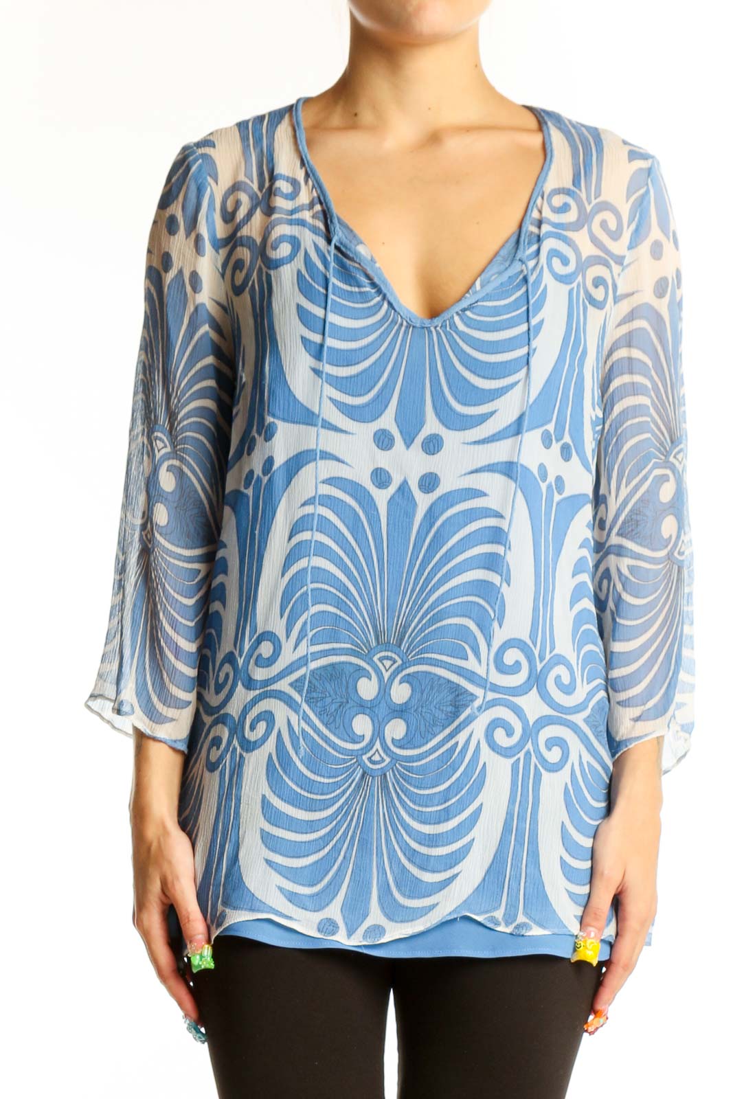Front view of SilkRoll blue floral print sheer V-neck tunic