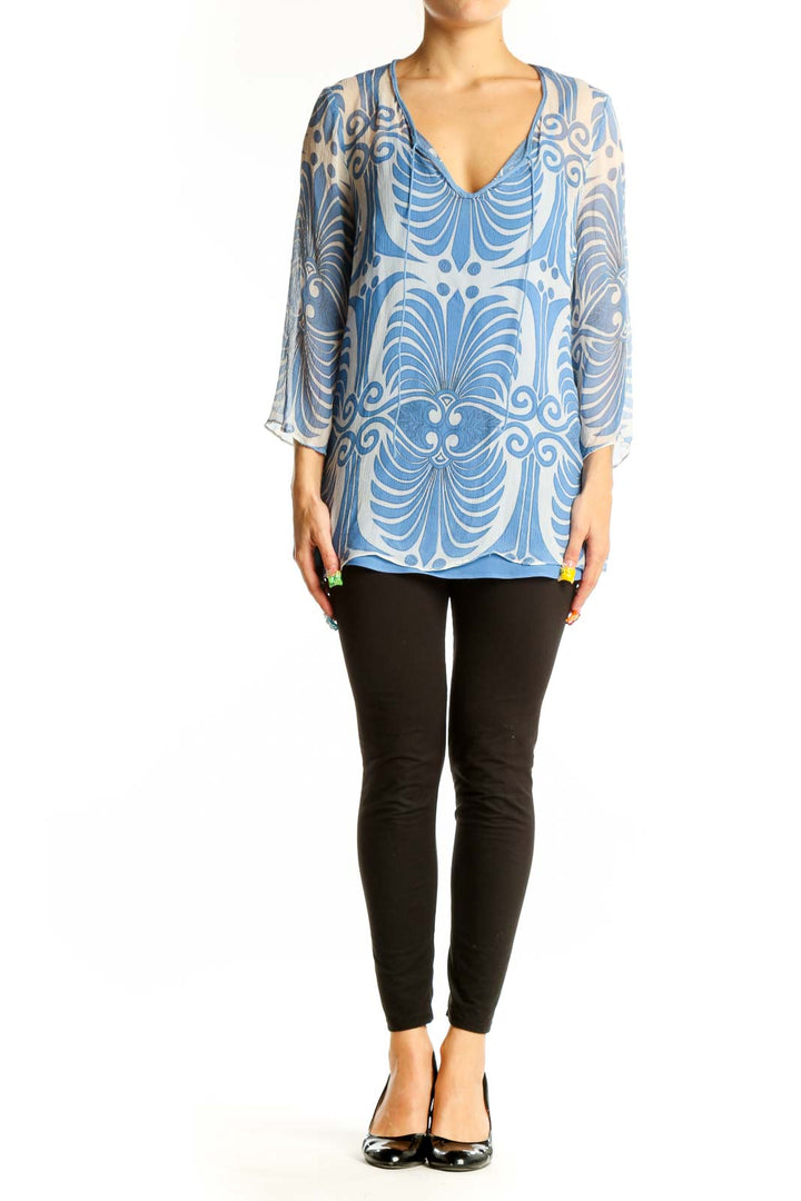 Front view of SilkRoll blue floral print sheer V-neck tunic