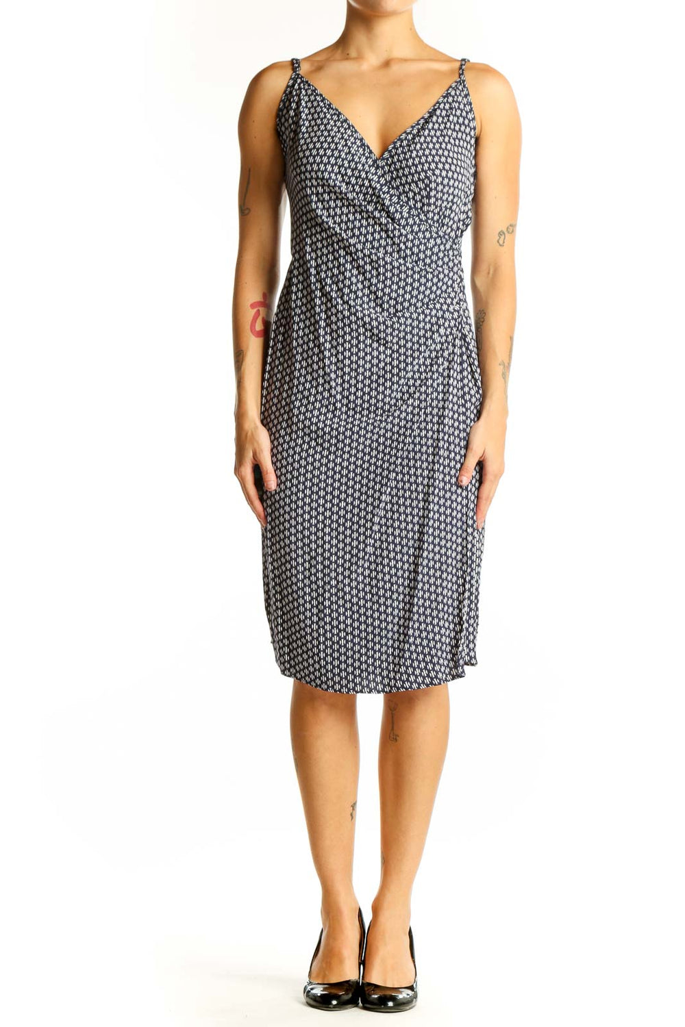 Front view of Bailey 44 black geometric print wrap dress with V-neckline and adjustable straps