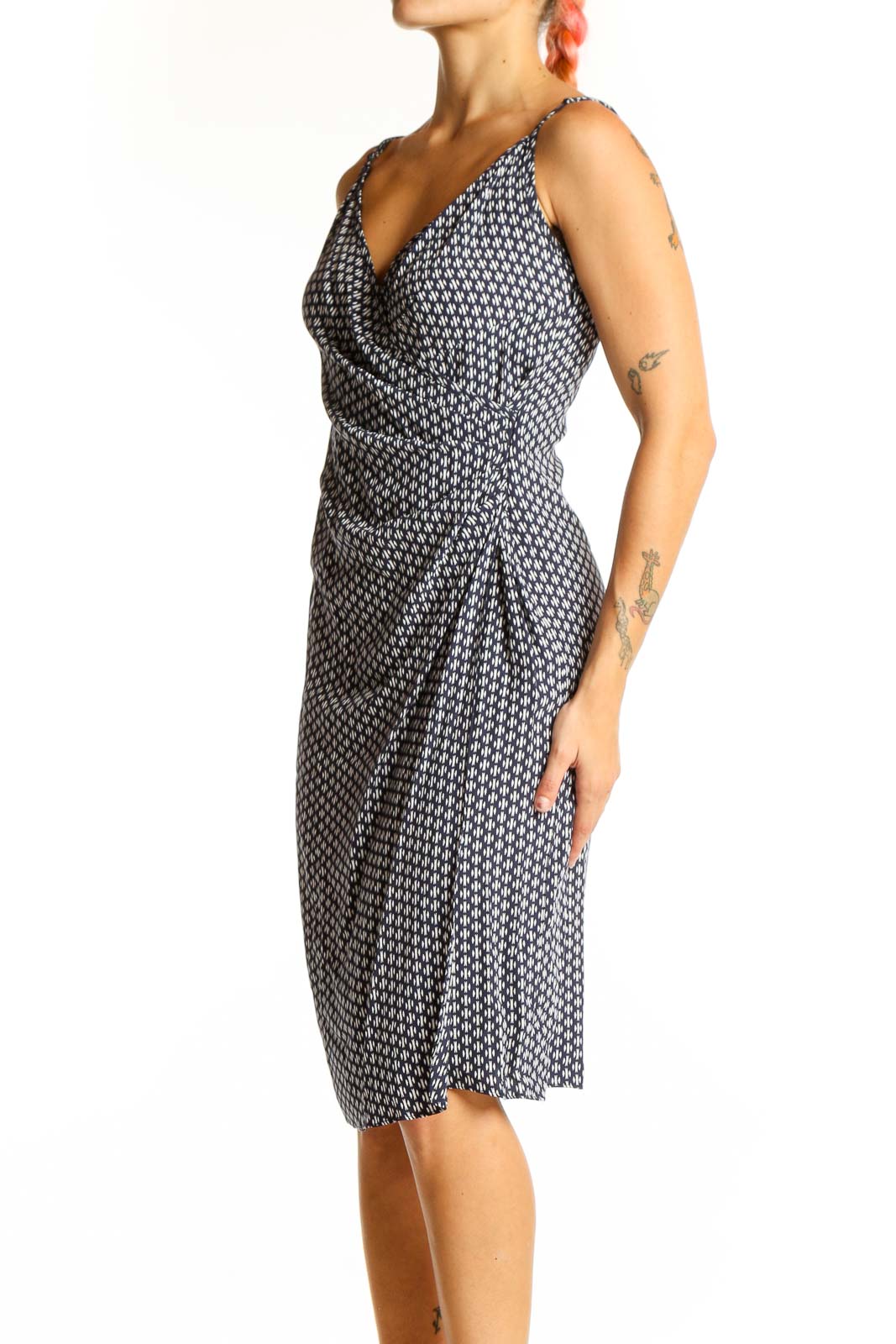 Front view of Bailey 44 black geometric print wrap dress with V-neckline and adjustable straps