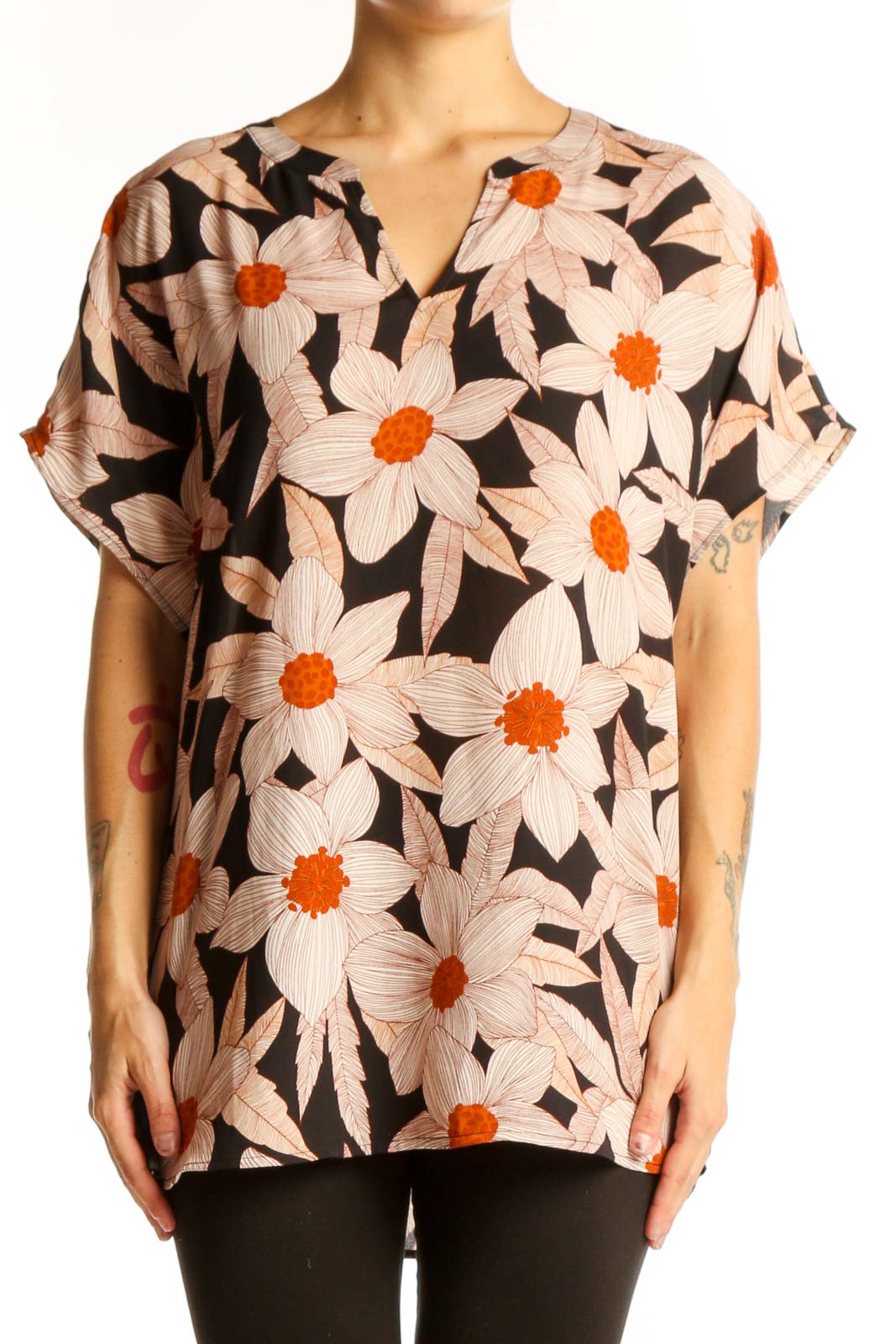 Front view of Cabi black blouse with pink and orange floral print