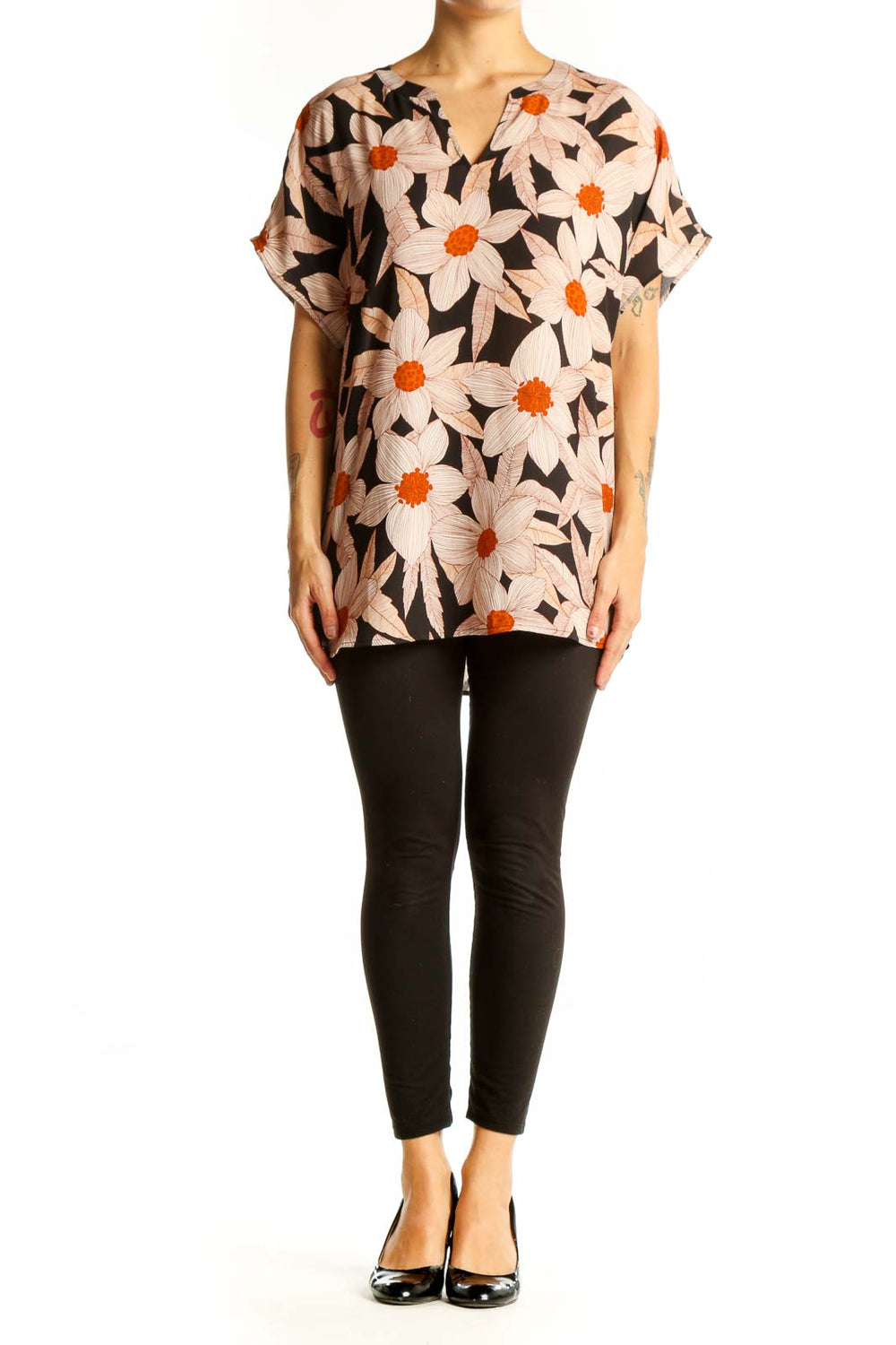 Front view of Cabi black blouse with pink and orange floral print