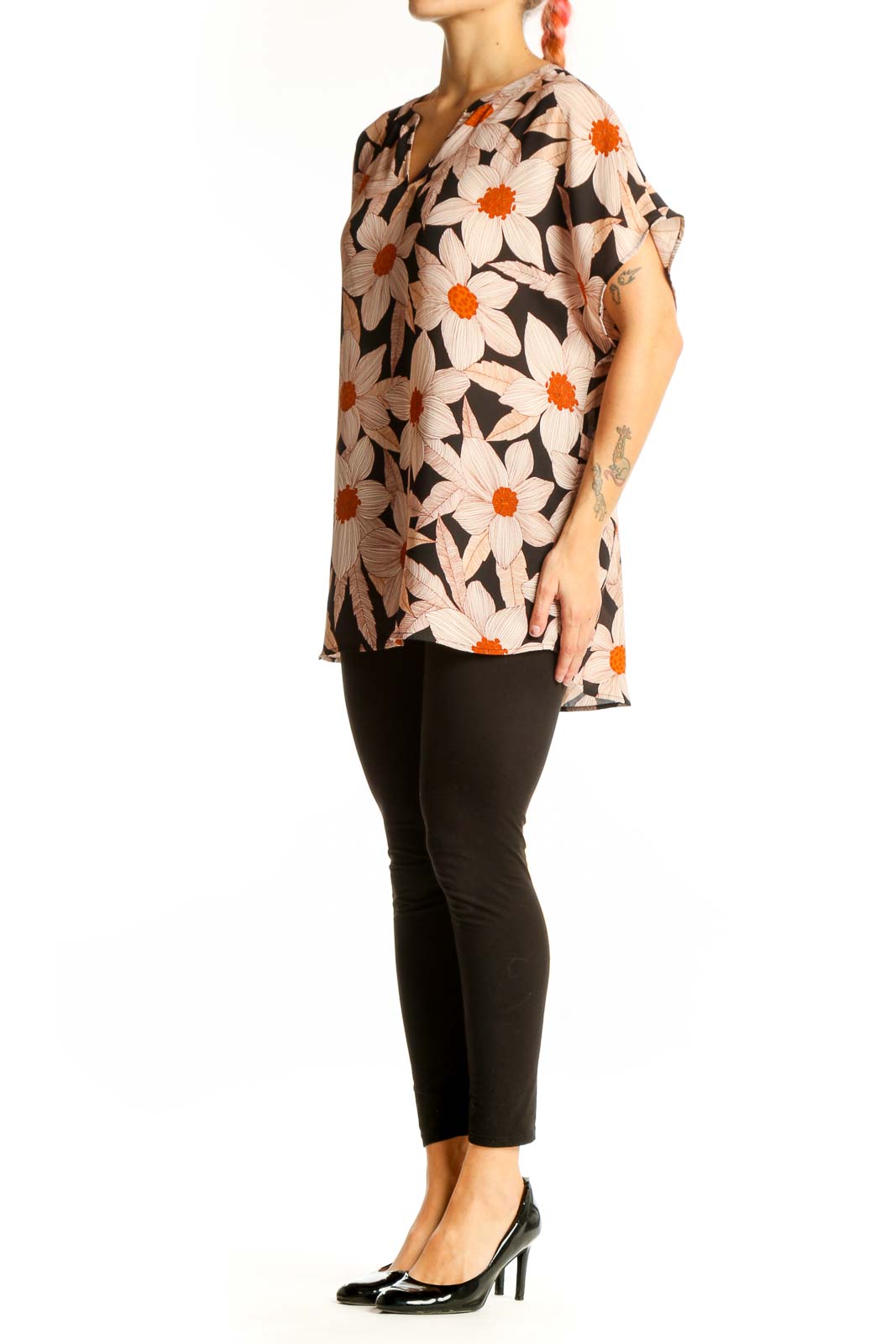 Front view of Cabi black blouse with pink and orange floral print