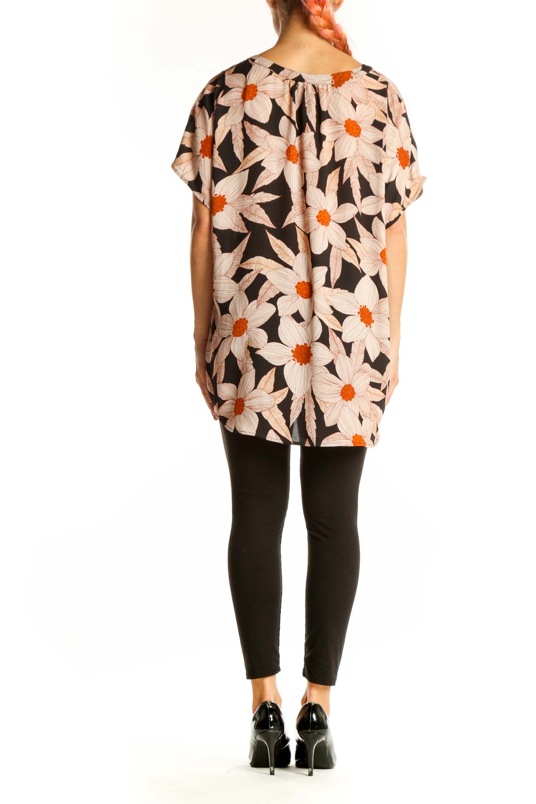 Side view of Cabi black blouse showing floral print and relaxed fit
