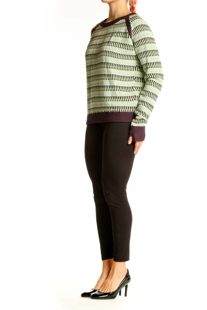 Front view of Lululemon mint green striped cotton knit sweater with purple accents