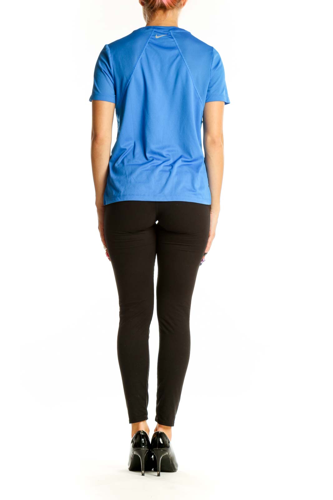 Side view of blue Nike short-sleeve performance top on model