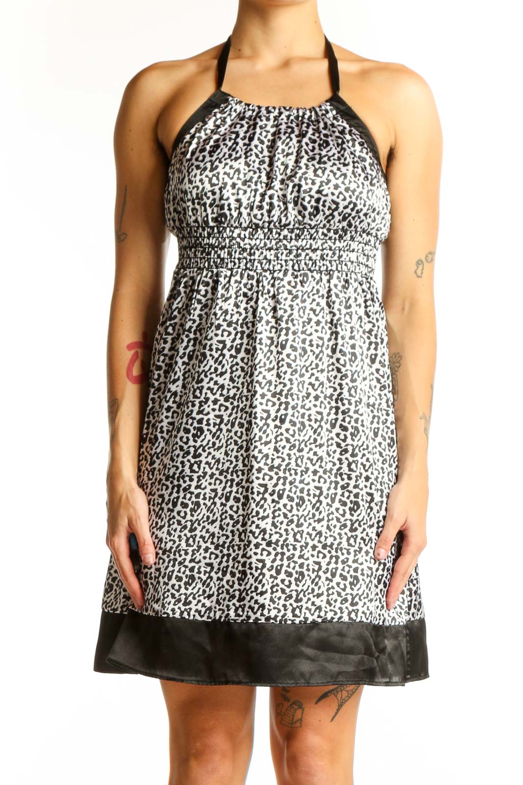 Front view of Guess Jeans black and white leopard print halter dress