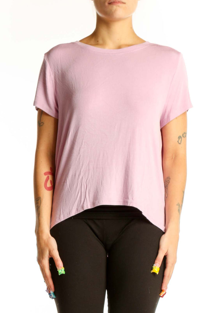 Front view of pink Athleta athletic top with short sleeves and crew neck