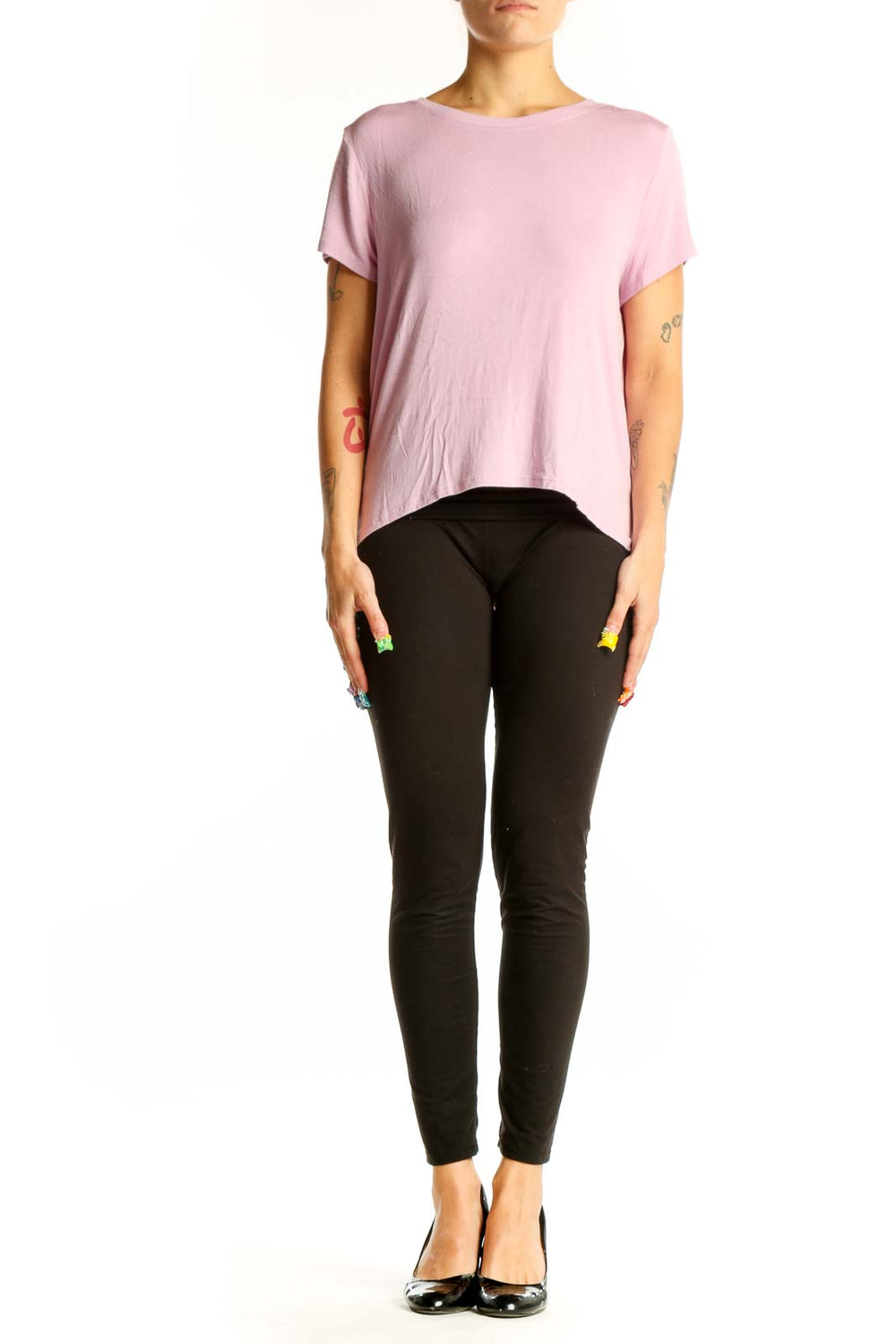 Front view of pink Athleta athletic top with short sleeves and crew neck