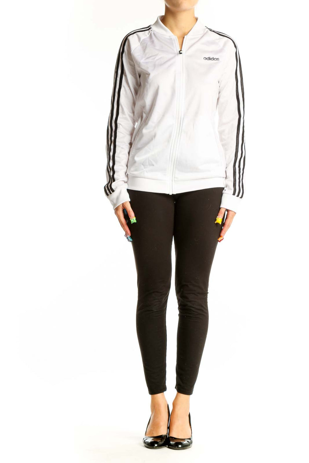Front view of white Adidas track jacket with black stripes