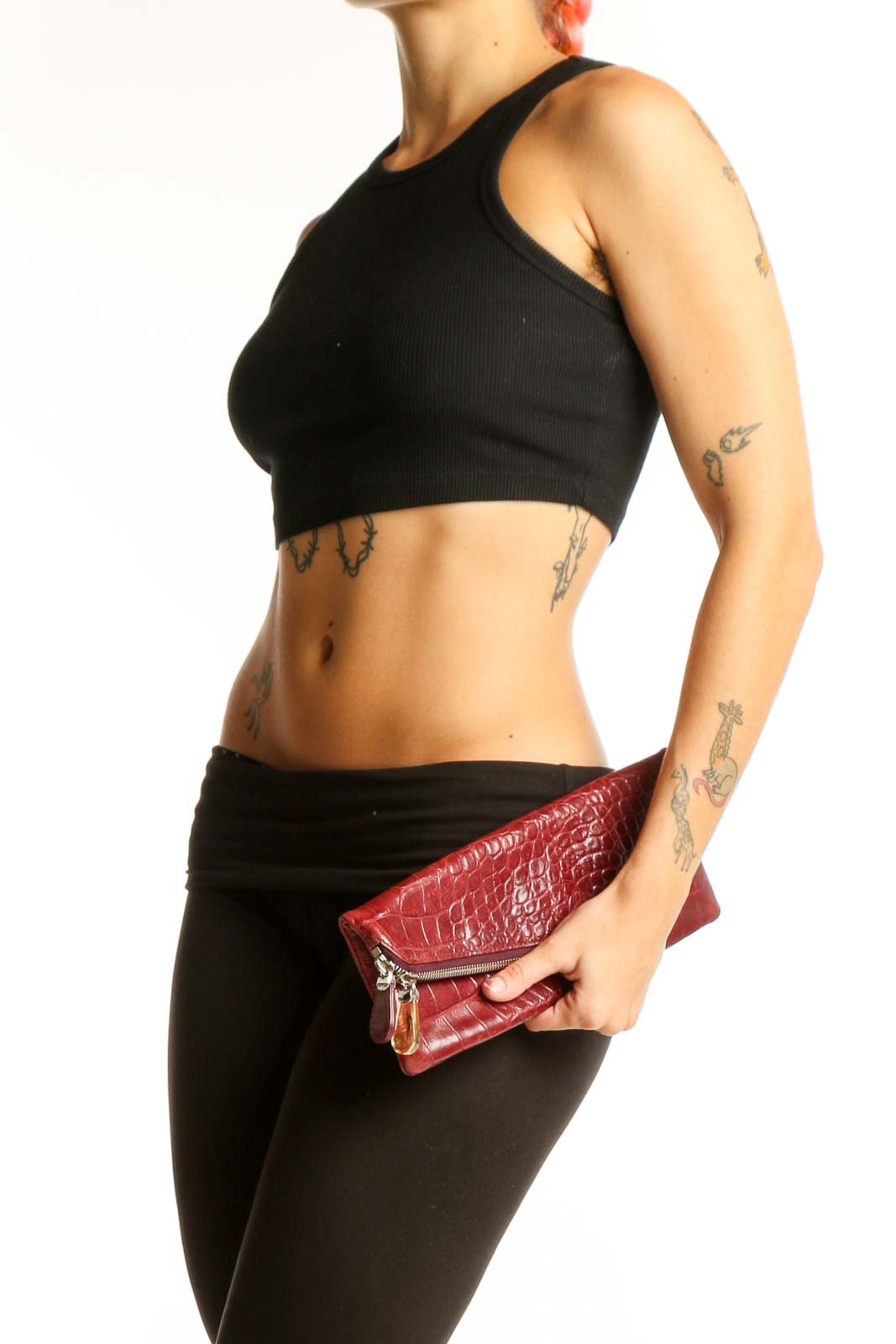 Front view of burgundy croc-embossed Henri Bendel envelope clutch with asymmetrical zipper