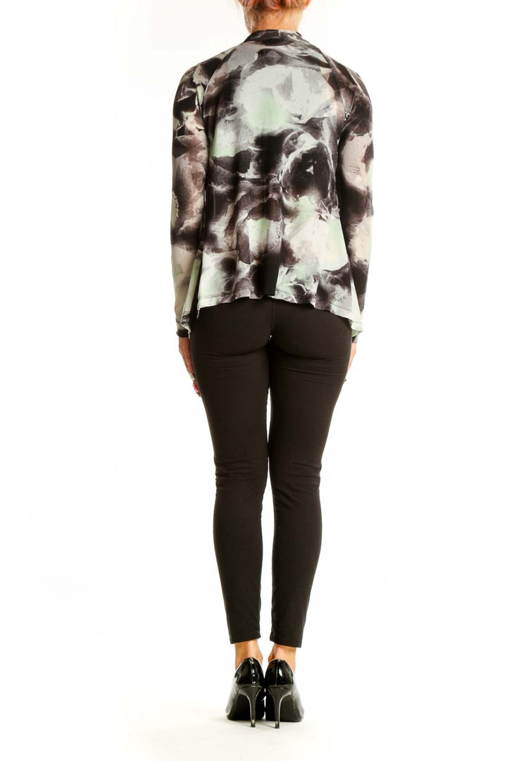 Side view of Vivienne Tam gray and white abstract print nylon top on model