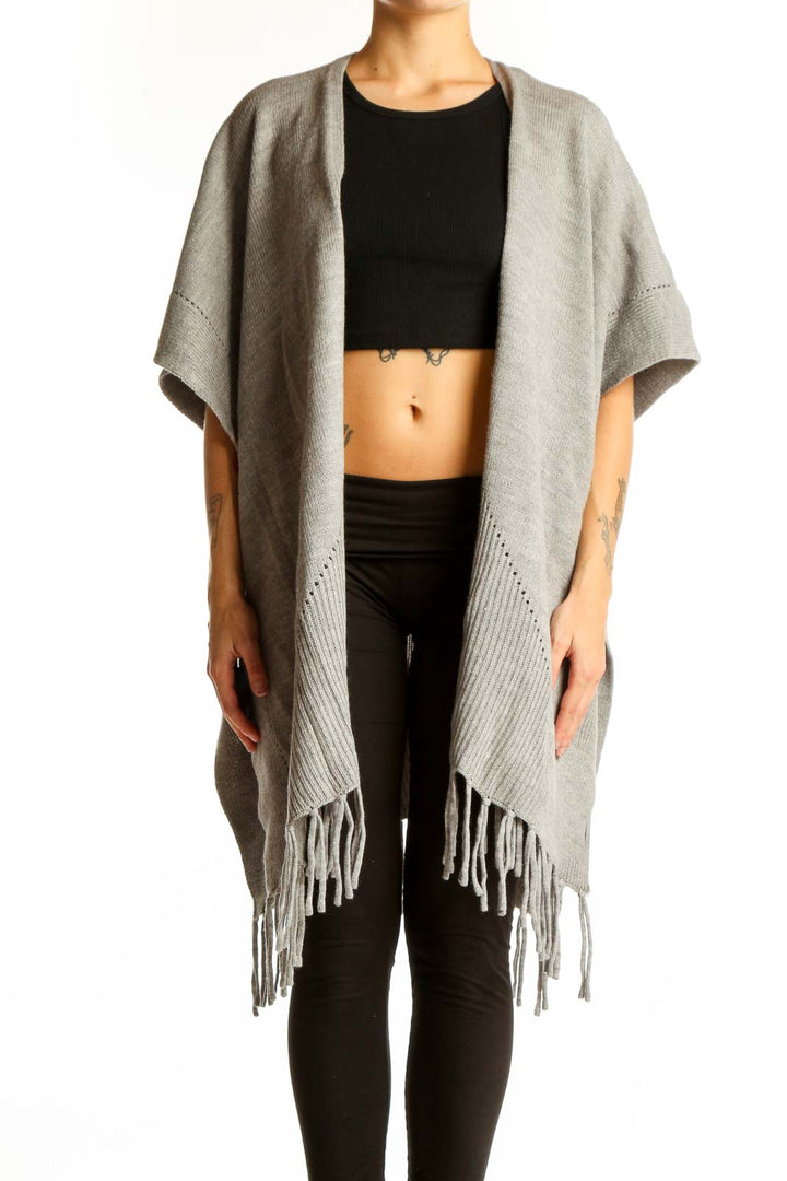 Front view of gray fringed acrylic knit poncho from Ann Taylor