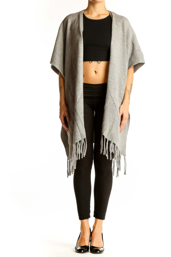 Front view of gray fringed acrylic knit poncho from Ann Taylor