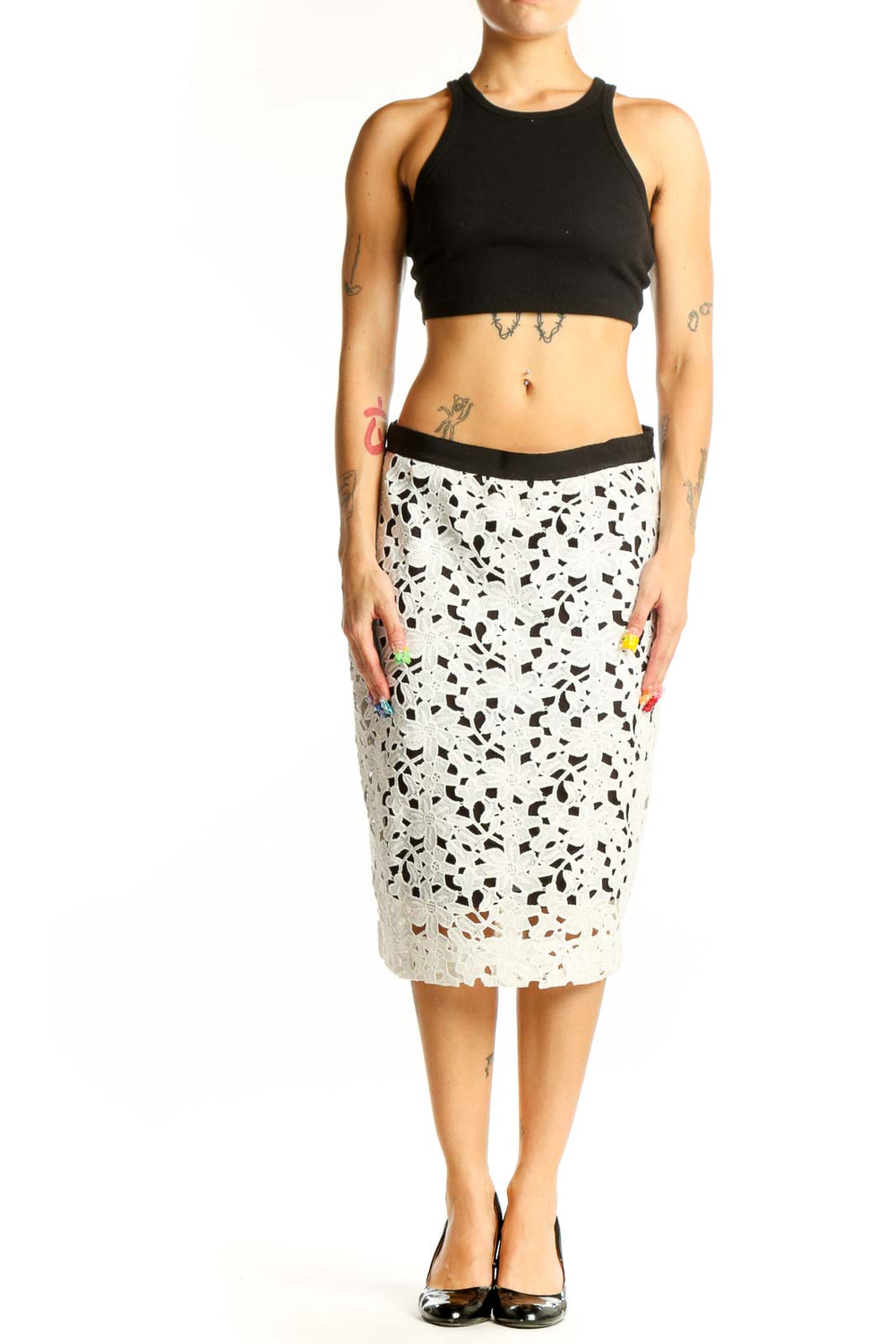 Front view of Cluny white floral lace midi skirt with black waistband