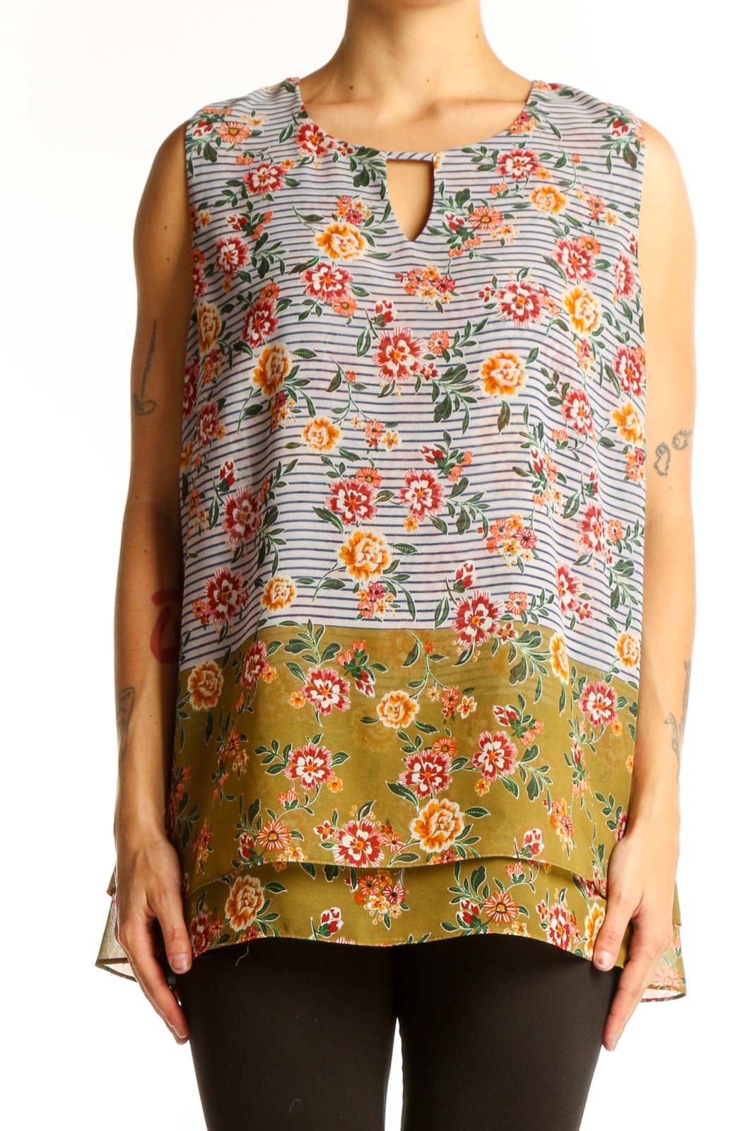 Front view of multicolor floral and striped sleeveless blouse by Cabi