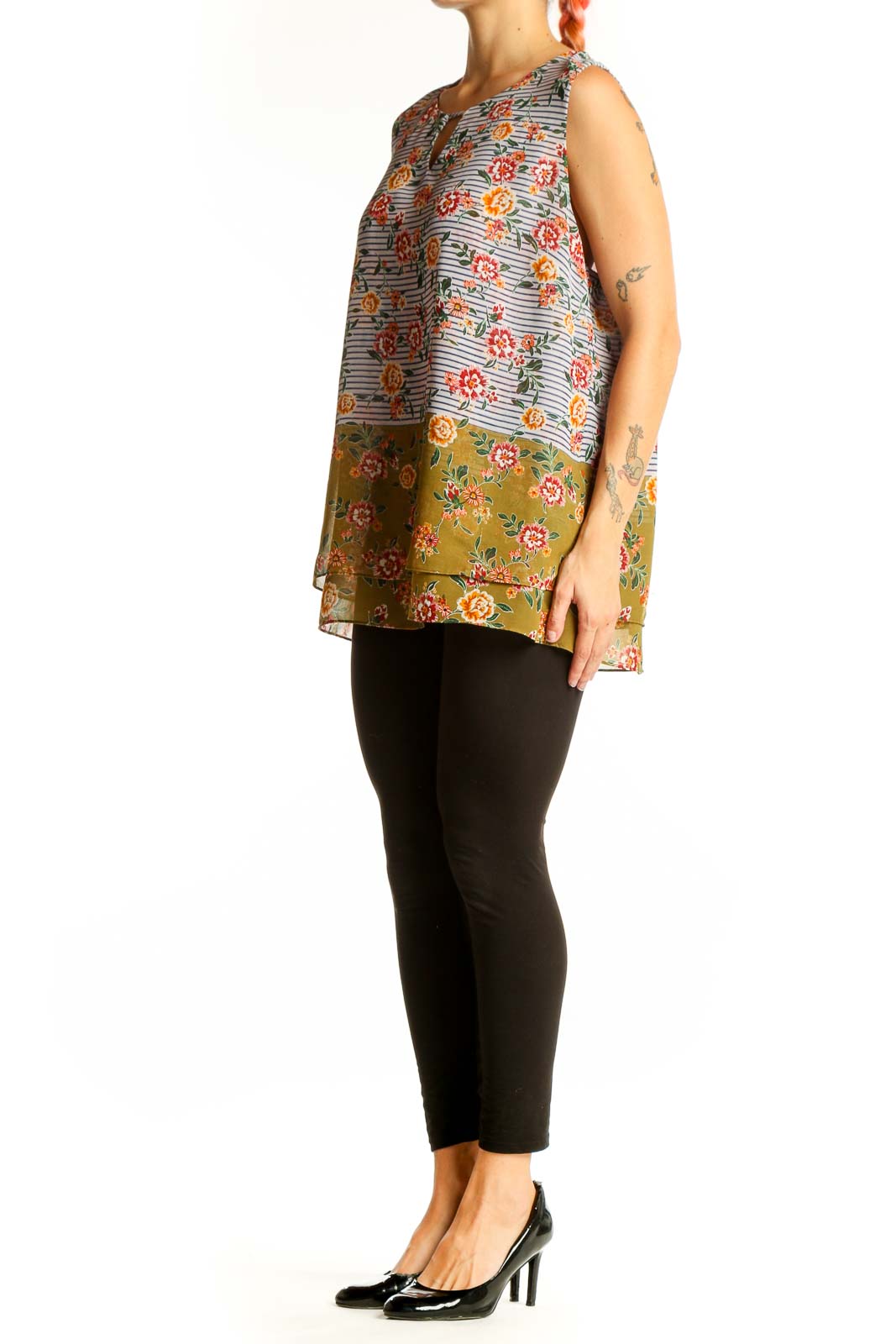 Front view of multicolor floral and striped sleeveless blouse by Cabi