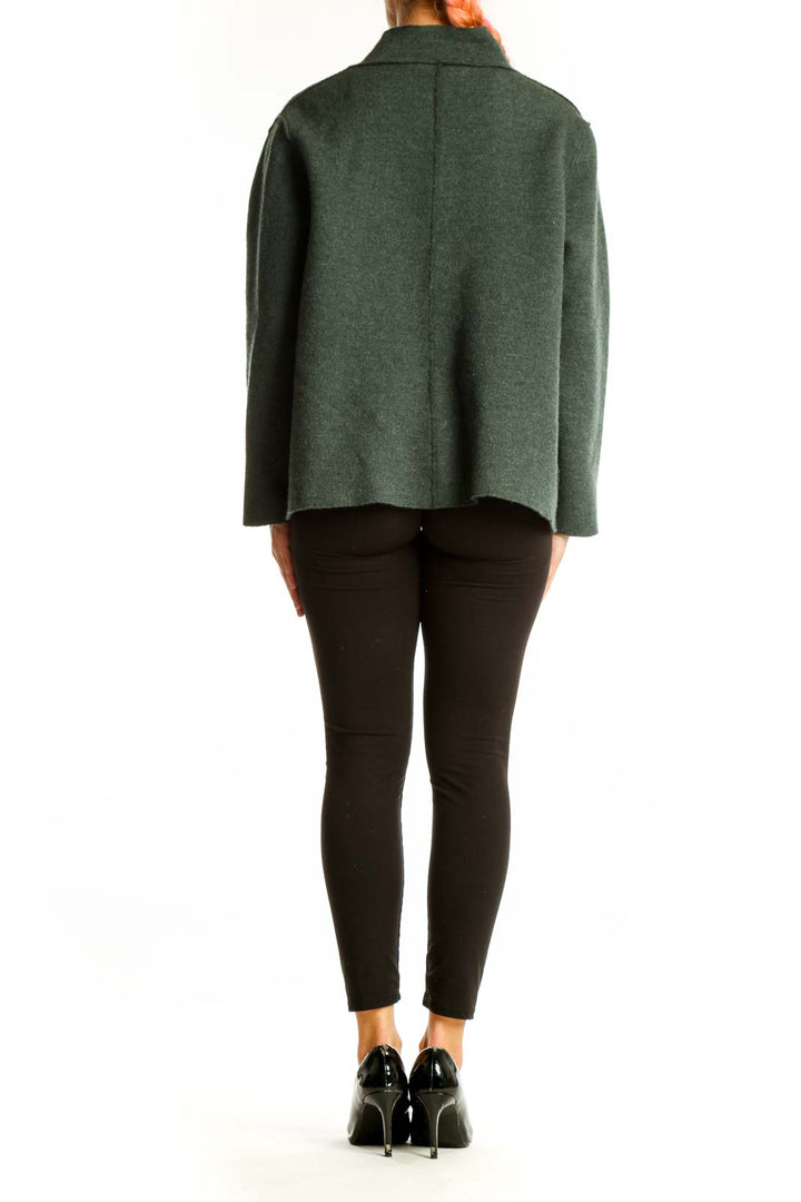 Side view of Forest Green Eileen Fisher knit jacket showing relaxed fit