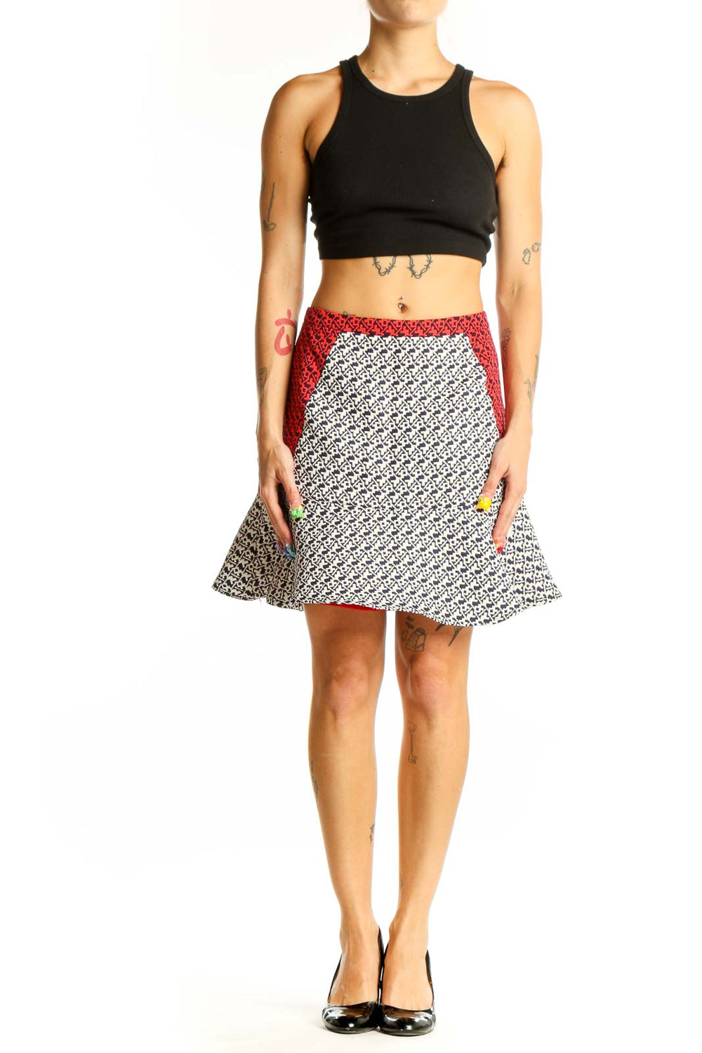 Front view of C. Luce black and white geometric print skirt with red waistband