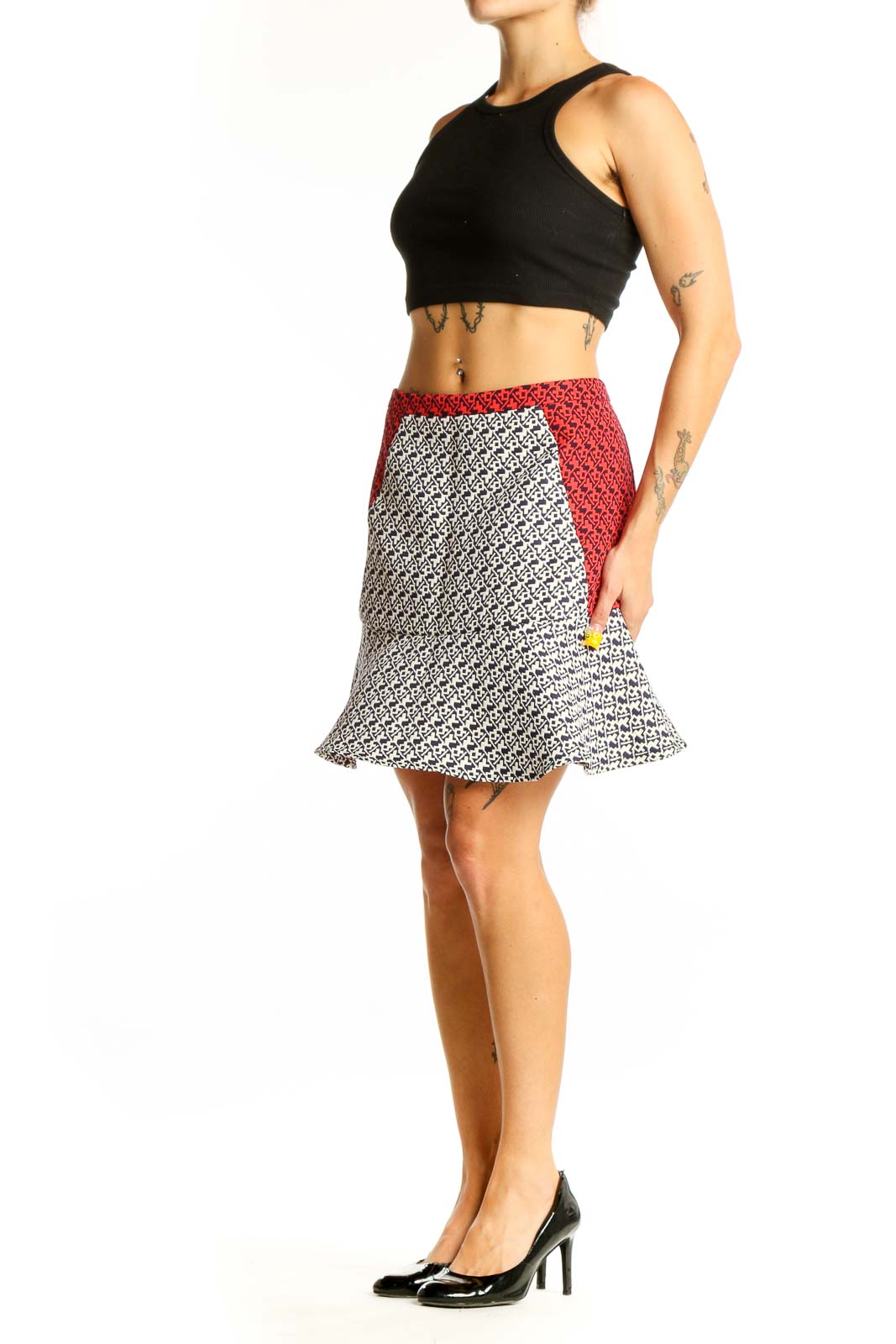 Front view of C. Luce black and white geometric print skirt with red waistband