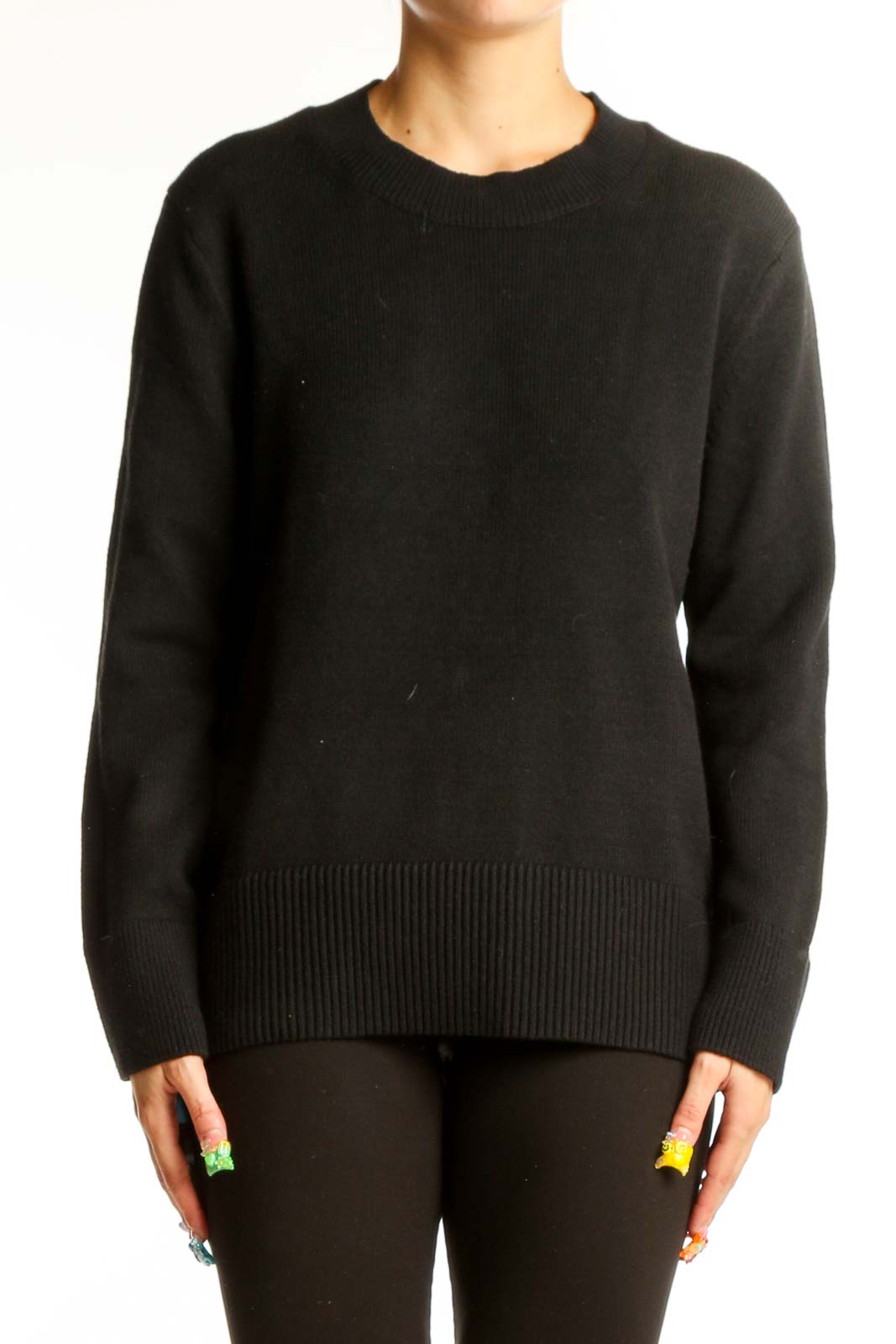 Front view of Banana Republic black crewneck sweater on model