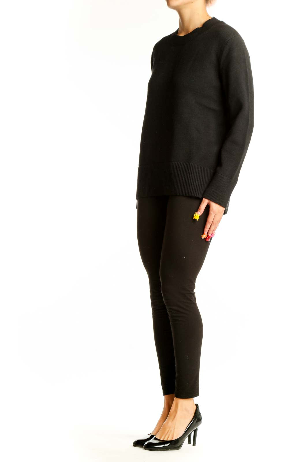 Front view of Banana Republic black crewneck sweater on model