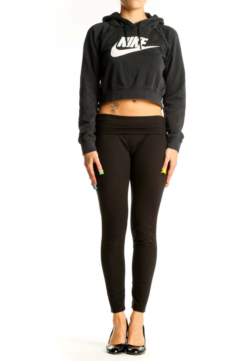 Front view of black Nike cropped hoodie with white swoosh logo