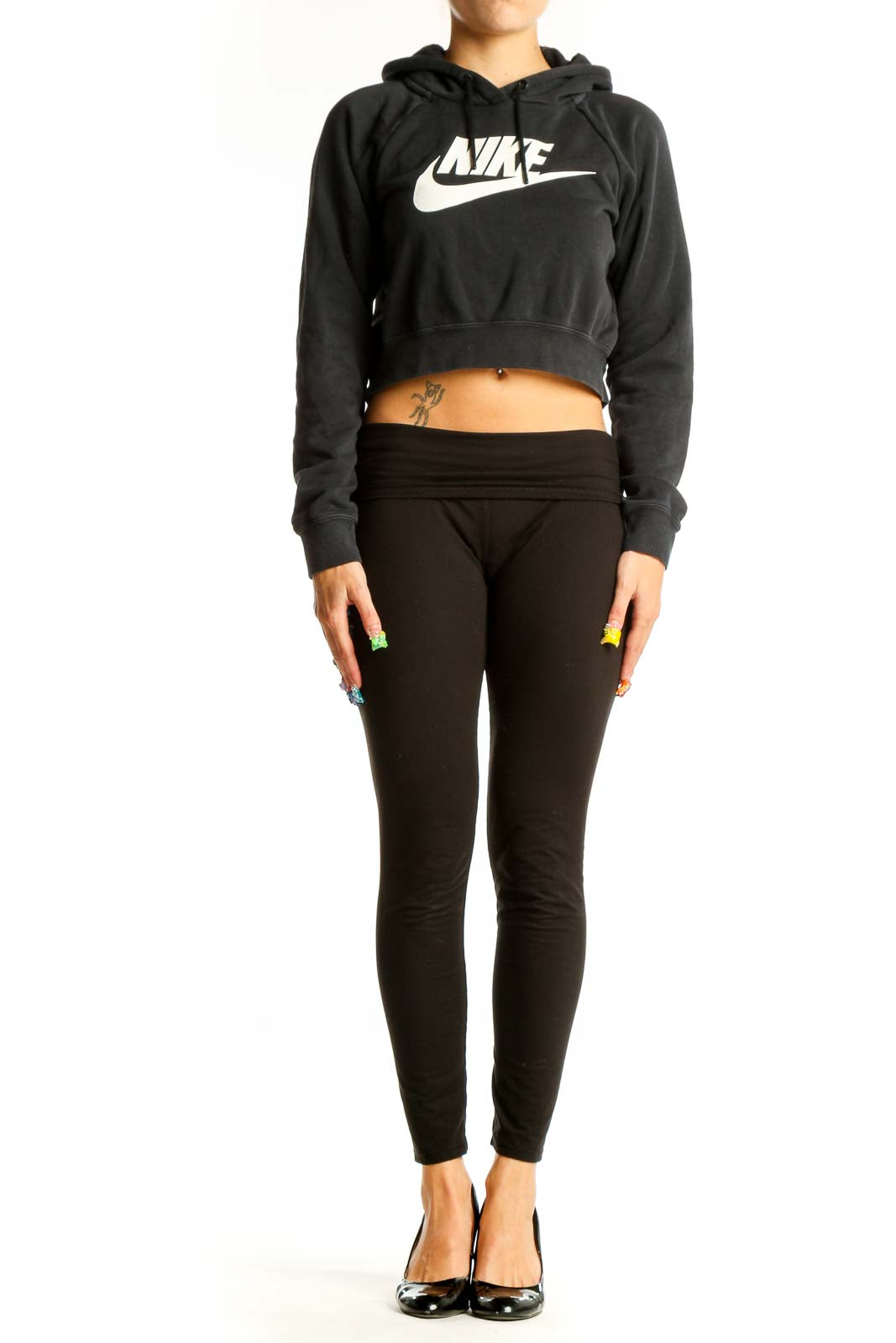Front view of black Nike cropped hoodie with white swoosh logo