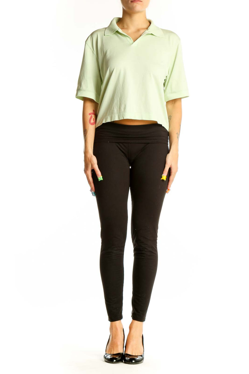 Front view of Lululemon mint green cropped polo top