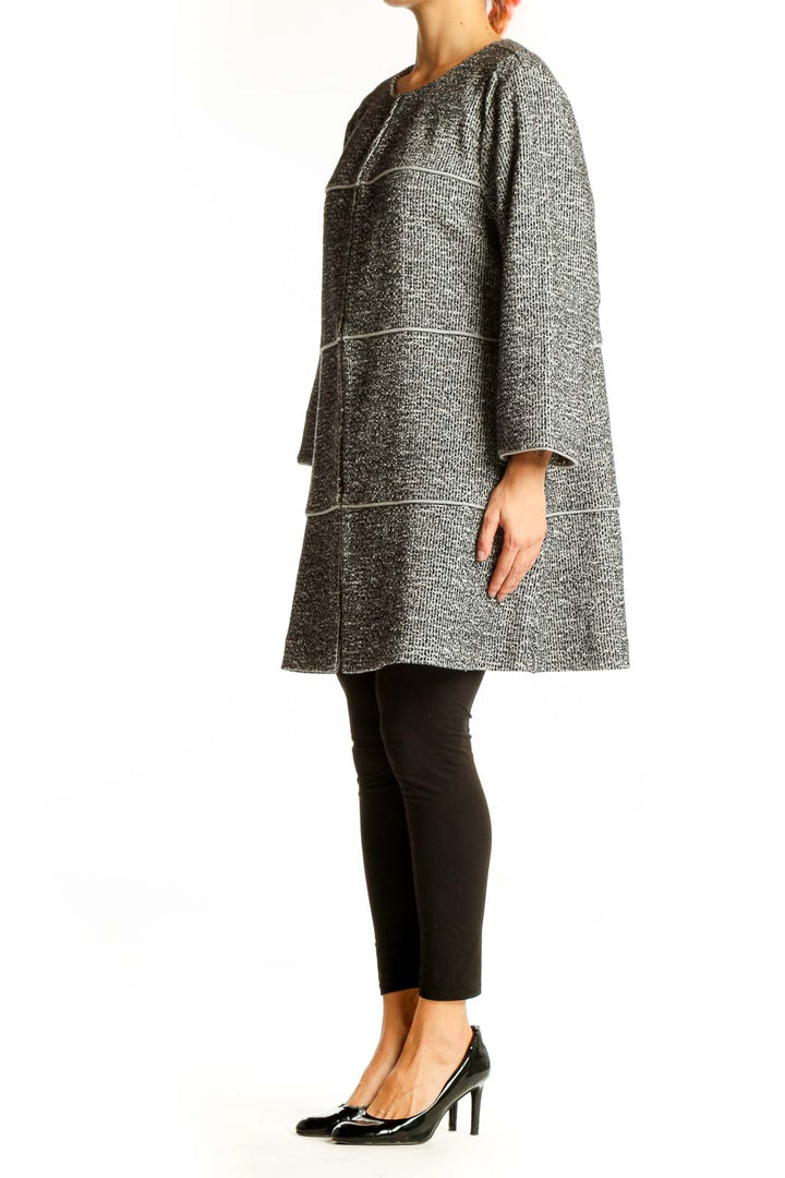 Front view of Cabi gray textured knit tunic sweater with grid pattern