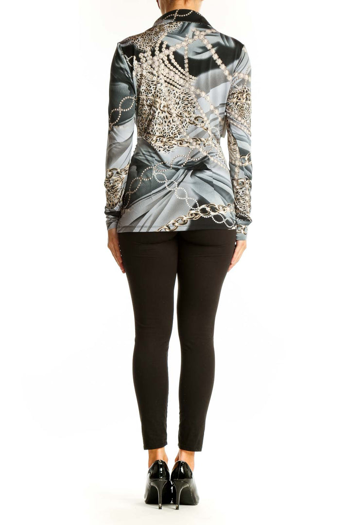 Side view of gray leopard print twist-front blouse by Cache