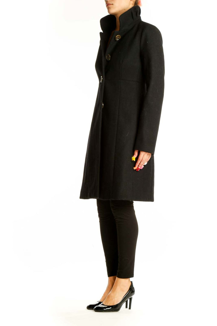 Front view of J.Crew black long coat with high collar and buttons