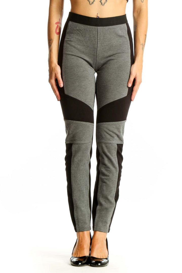 Front view of BCBG MaxAzria gray and black color block leggings