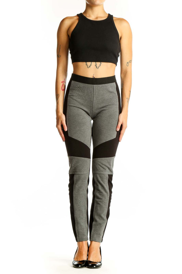 Front view of BCBG MaxAzria gray and black color block leggings