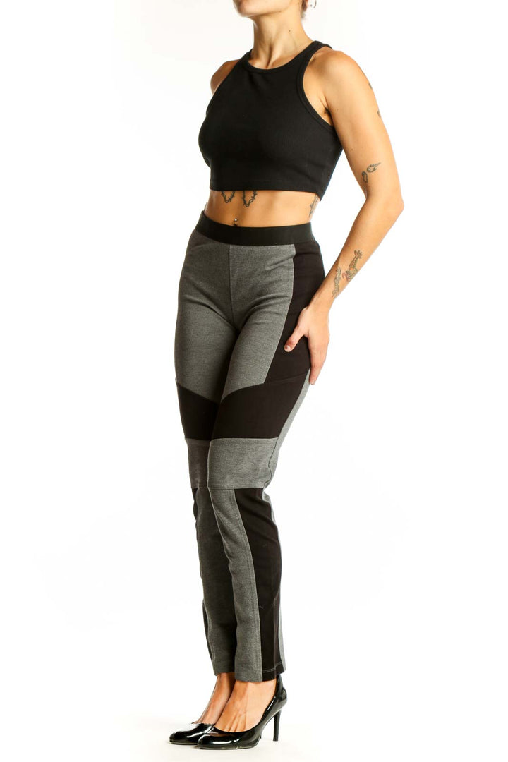 Front view of BCBG MaxAzria gray and black color block leggings
