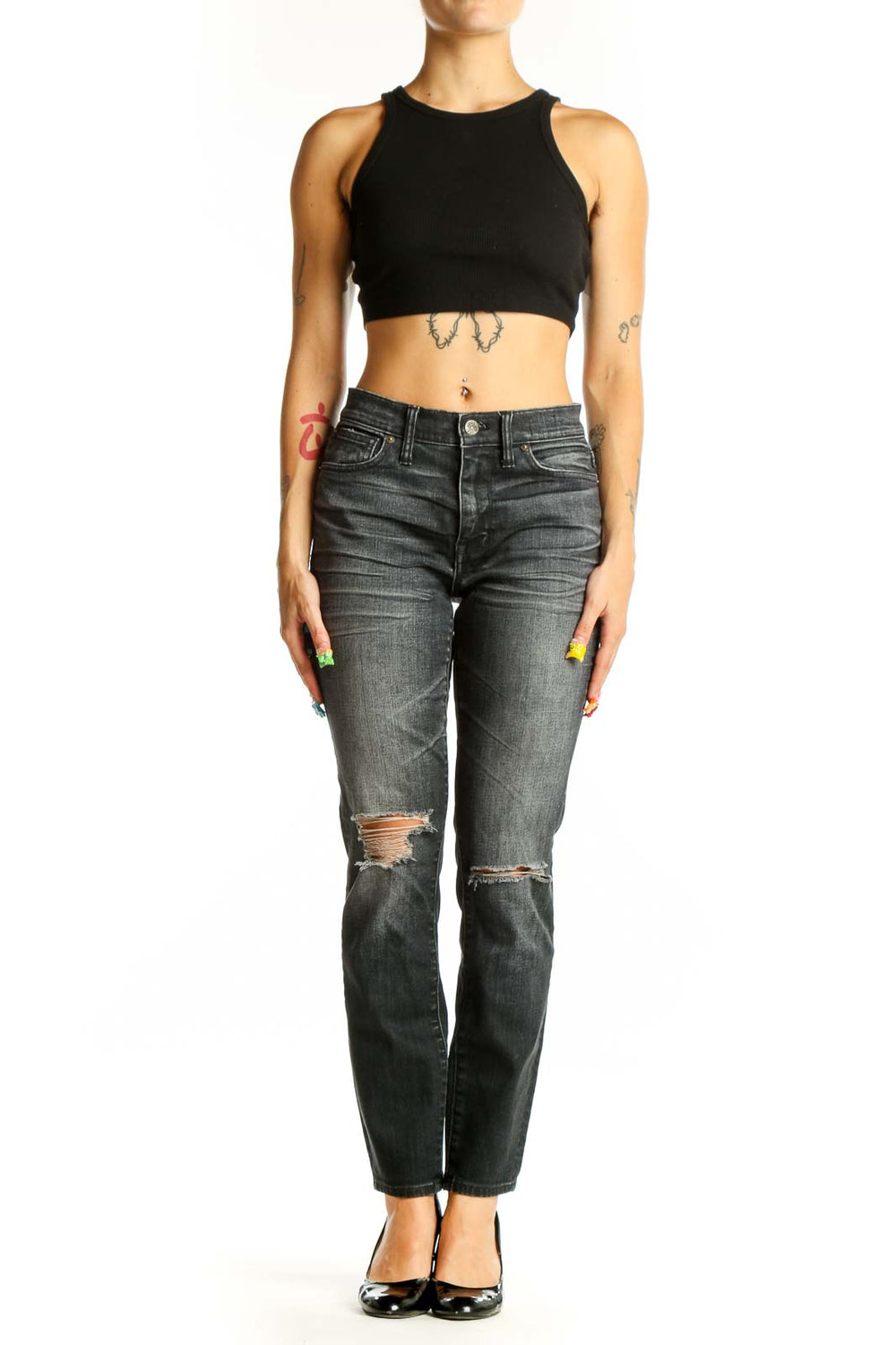 Front view of Madewell charcoal straight leg jeans with distressed knees