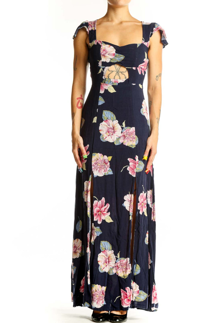 Front view of Reformed navy floral maxi dress with sweetheart neckline