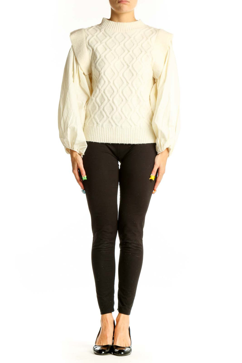 Front view of cream cable knit sweater with puff sleeves by a loves a